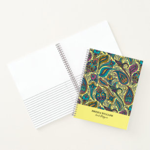 Colourful paisley ethnic pattern on yellow notebook