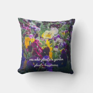 Colourful pansies in bloom in the country garden cushion