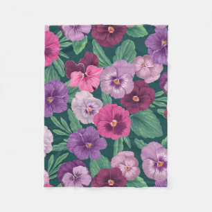 Colourful pansies on dark greenish blue fleece blanket