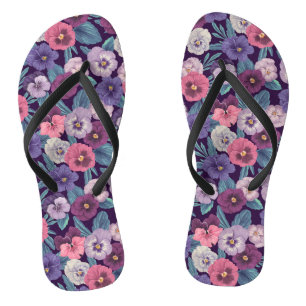 Colourful pansies on deep violet flip flops