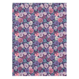 Colourful pansies on deep violet tablecloth