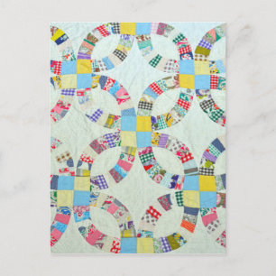 Colourful patchwork quilt postcard
