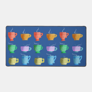 Colourful Patterned Whimsical Mugs on Blue Desk Mat
