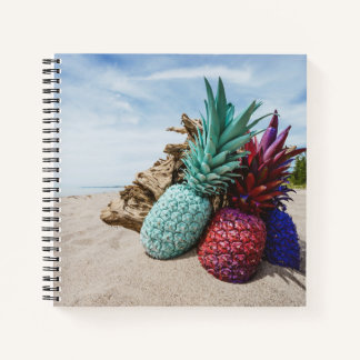 Colourful Pineapples on a Sandy Beach Notebook