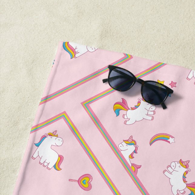 Colourful Pink Unicorns Beach Towel (In Situ)