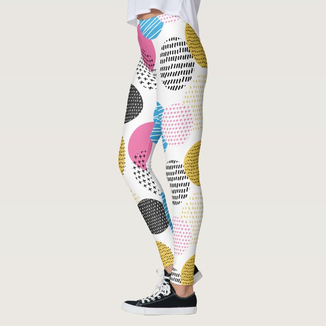 Colourful Polka Dots Leggings (A pair of leggings with a pattern of colorful circles and lines, the circles are pink, blue, yellow.)