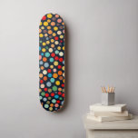 Colourful Polka Dots on Dark Background Skateboard<br><div class="desc">This design is a fun and festive way to add a pop of colour to your home or office. It features colourful polka dots of all sizes on a black background. The contrasting colours make the polka dots stand out, and the overall design is both eye-catching and playful.</div>