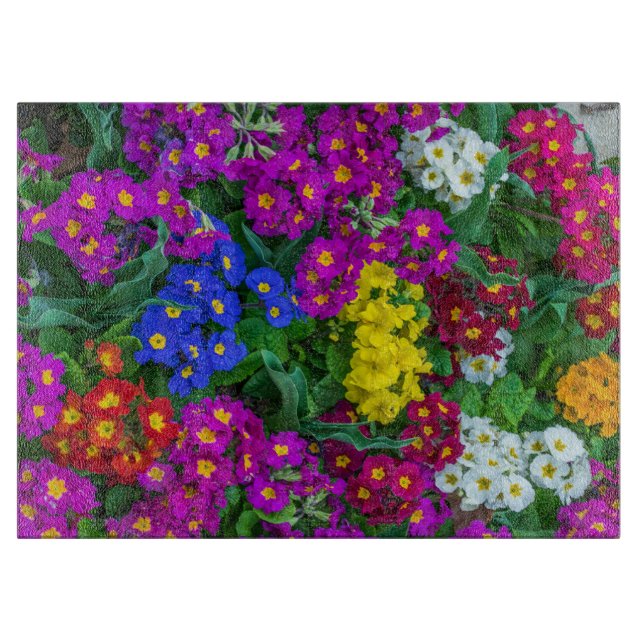 Colourful primroses glass cutting board (Front)