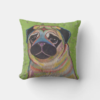 Colourful Pug pillow on green background
