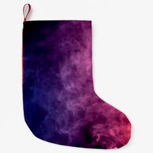 Colourful purple and blue smoke clouds on dark bac small christmas stocking