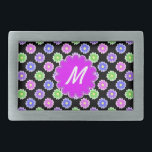 Colourful Retro Flower Pattern Monogram Belt Buckle<br><div class="desc">This pretty, girly design features a bright, colourful floral pattern in shades of pink, purple, blue and green on a black background. It has a flower - shaped space in orchid - purple where you can add your monogram / initial in white to personalise. It's a slightly retro, very chic...</div>
