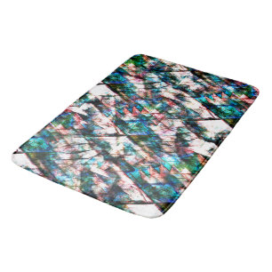 Colourful scratches and stains with strong contras bath mat