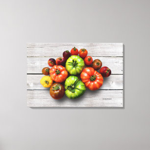 Colourful Striped Tomatoes on Weathered Table Canvas Print