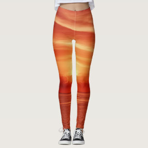 Colourful sunrise at sea, dramatic clouds. leggings