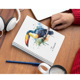 colourful toucan sitting on a  branch notebook