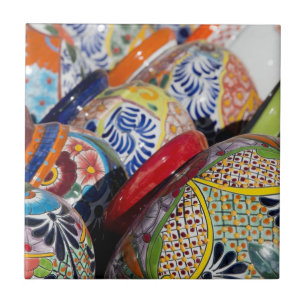 Colourful traditional hand-painted Mexican pottery Tile