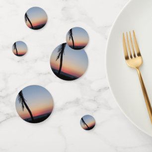 Colourful tropical sunset on table confetti