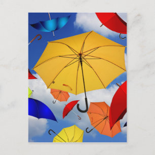 Colourful Umbrellas Floating in the Sky Postcard