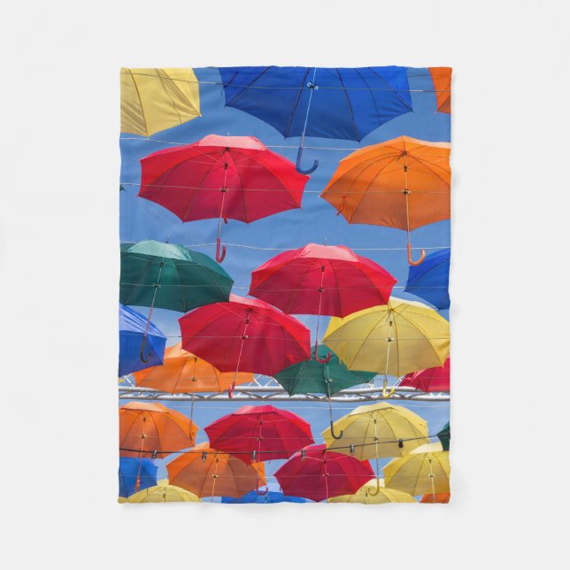 Colourful umbrellas in the sky blue orange red  fleece blanket (Front)