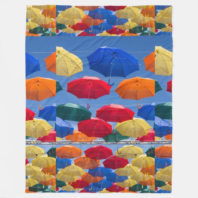 Colourful umbrellas in the sky blue orange red  fleece blanket (Front)
