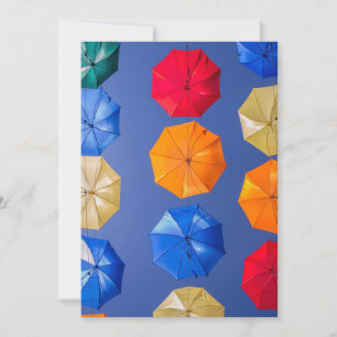 Colourful umbrellas in the sky blue orange red  invitation