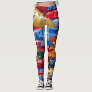 Colourful umbrellas in the sky blue orange red  leggings