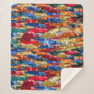 Colourful umbrellas in the sky blue orange red  sherpa blanket