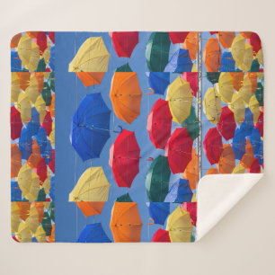 Colourful umbrellas in the sky blue orange red  sherpa blanket