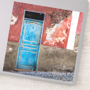 Colourful wall with blue door