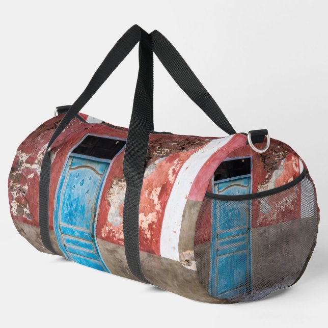 Colourful wall with blue door duffle bag (Right Corner)