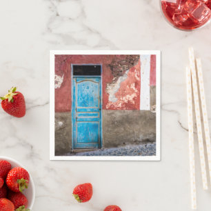 Colourful wall with blue door napkin