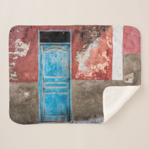 Colourful wall with blue door sherpa blanket