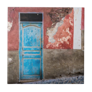 Colourful wall with blue door tile
