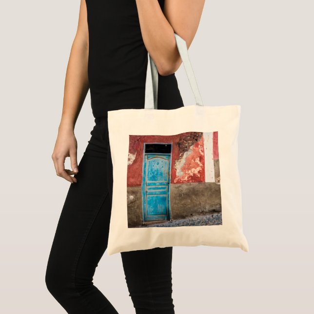 Colourful wall with blue door tote bag (Front (Product))
