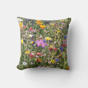 Colourful wildflower meadow, vibrant pattern. cushion