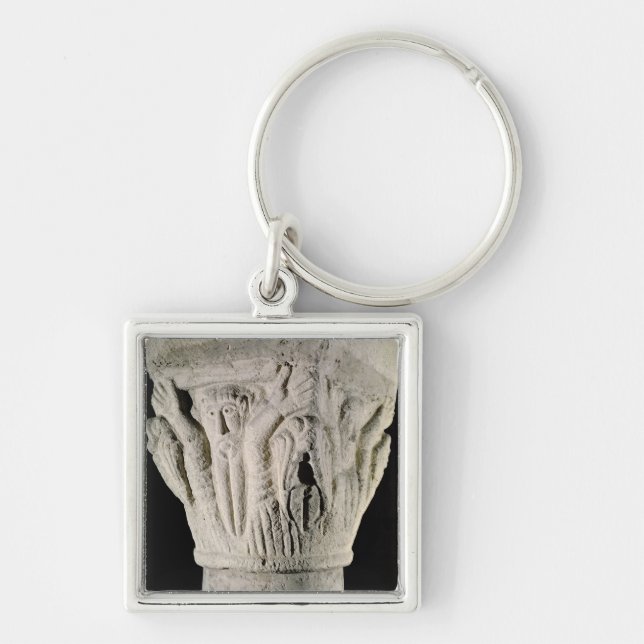 Column capital with a man with raised arms key ring (Front)