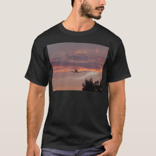 Commercial Jet Landing At Sunset T-Shirt