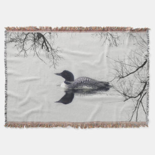 Common Loon Swims in a Northern Lake in Winter Throw Blanket
