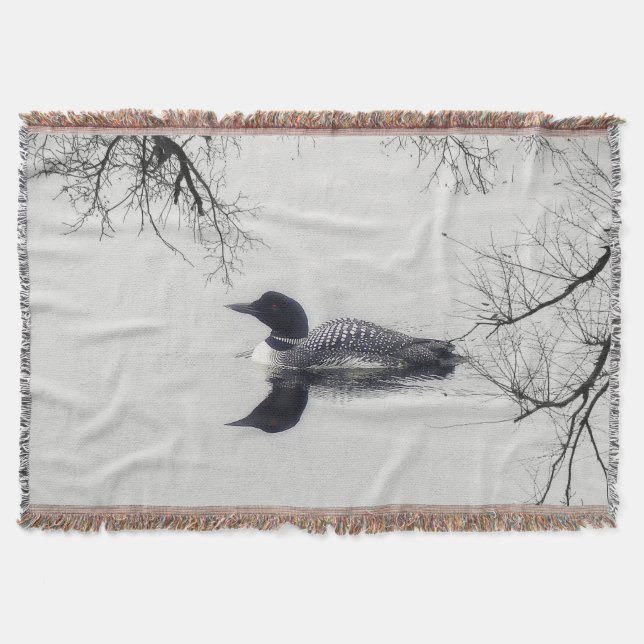 Common Loon Swims in a Northern Lake in Winter Throw Blanket (Front)