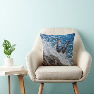 Common Morpho Butterfly Flying Over Ocean Rock Cushion