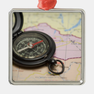 Compass on a map 2 metal tree decoration