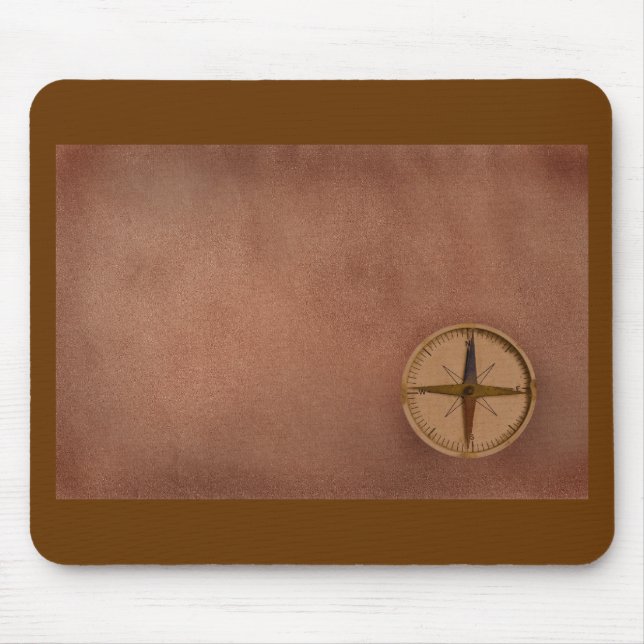 compass on old paper mouse mat (Front)