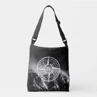 Compass star emblem monogram dramatic mountains