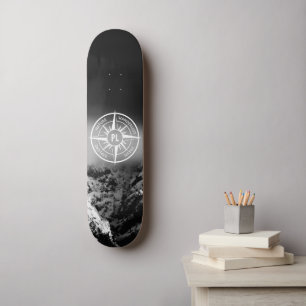 Compass star emblem monogram dramatic mountains skateboard