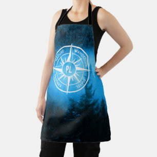 Compass star emblem monogram fog in spruce forest apron