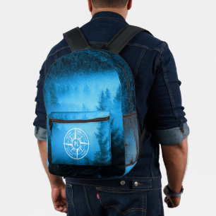 Compass star emblem monogram fog in spruce forest printed backpack