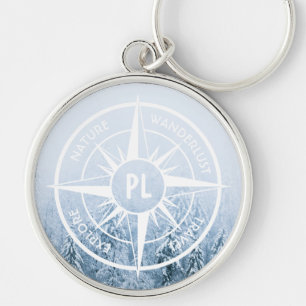 Compass star emblem monogram winter spruce forest key ring