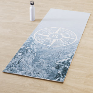 Compass star emblem monogram winter spruce forest yoga mat