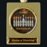 Completely Customisable Shalom Hanukkah Menorah Gold Plated Banner Ornament<br><div class="desc">This striking ornament has all the makings of a Chanukah keepsake any way it is customised: the stylised menorah with the Hebrew characters in the candles' flames; the phrases, "Happy Hanukkah" and "Shalom at Hanukkah"; the warm backgrounds of brown with peach-coloured nebulae, both in the central circular cutout and the...</div>
