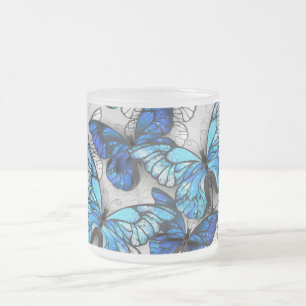 Composition of White and Blue Butterflies Frosted Glass Coffee Mug